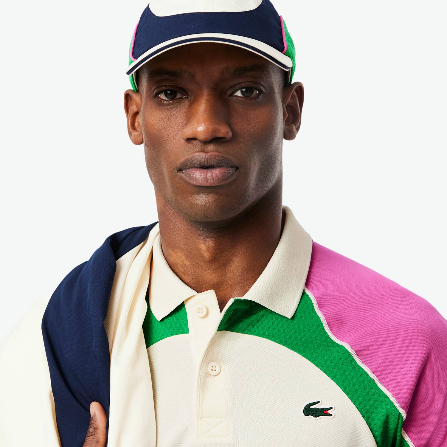 Polo Tennis color-block Ultra Dry Homme Lacoste Blanc/Rose/Vert : L’alliance de style et performance pour l’homme moderne