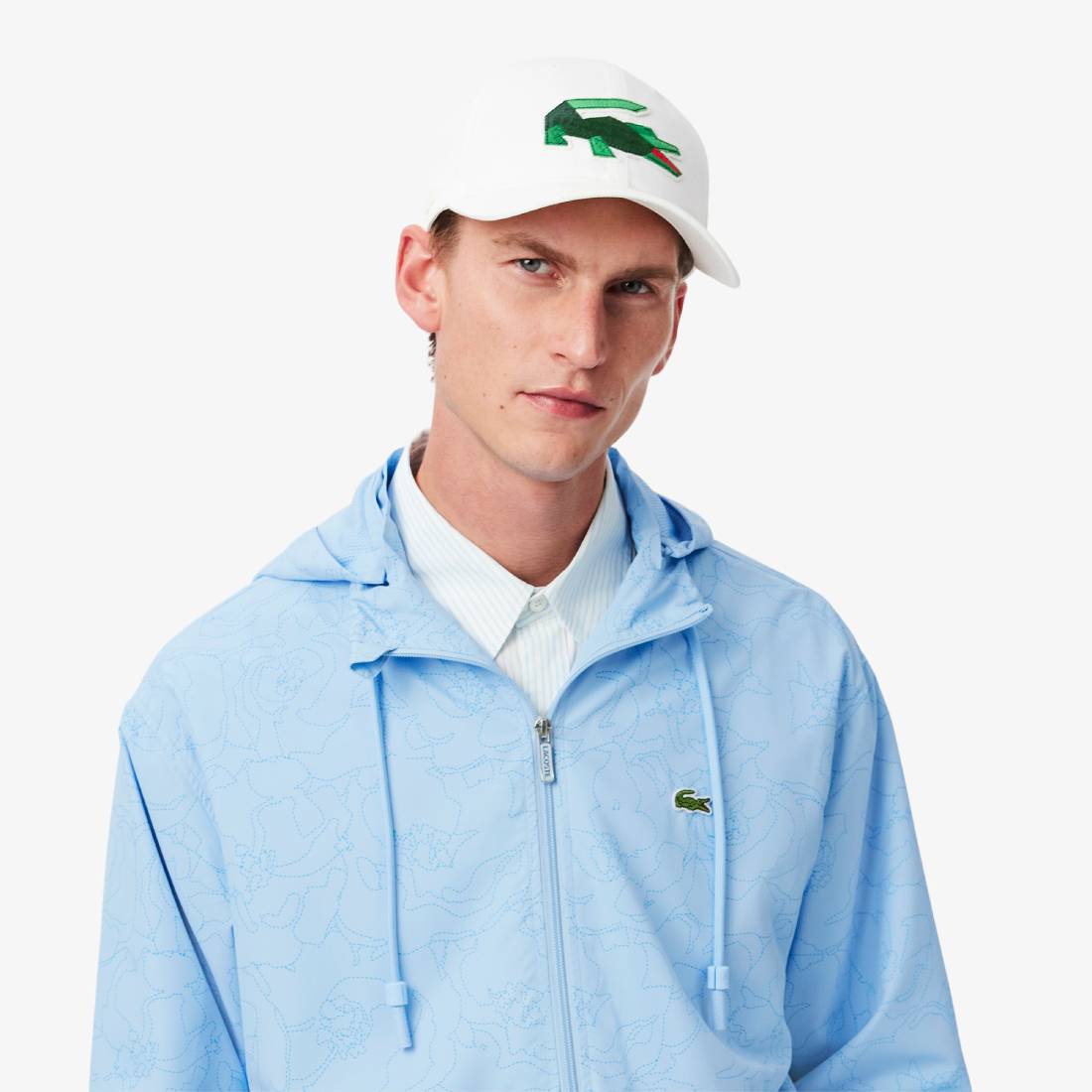 Veste coupe-vent Homme Lacoste imprimé fleurs Bleu pastel : Élégance et Protection pour Toutes les Saisons