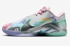 LeBron XXII « Currency » Baskets Basses Unisexe Blanc/Vert Lueur/Mousse Rose/Bleu Baltique