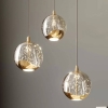 LUCANDE Suspension LED HAYLEY sphères verre 3 lampes doré